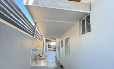 Recently renovated with extra lot,  4 Bedrooms, 3 bathrooms, 2 car garage.