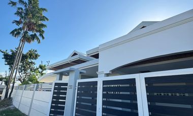Recently renovated with extra lot,  4 Bedrooms, 3 bathrooms, 2 car garage.