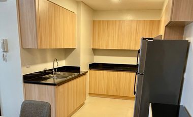 Semi-furnished 2-bedroom for rent with parking and balcony at Verve Residences