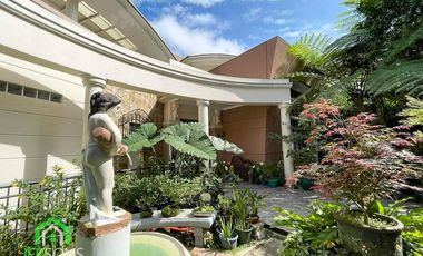 Large house with beautiful garden scapes