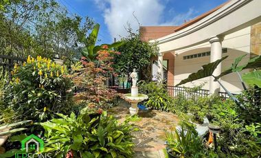 Large house with beautiful garden scapes