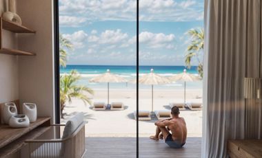 Departamento Penthouse con living y vista directa al mar Caribe