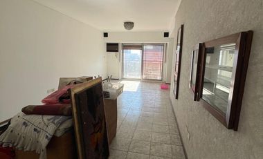 Departamento de 4 ambientes con cochera en