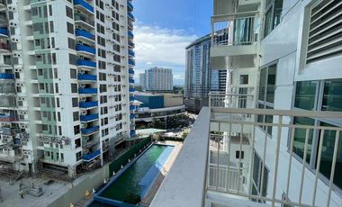 1BR UNIT IN PATIO SUITE with parking FOR SALE