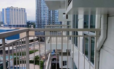 1BR UNIT IN PATIO SUITE with parking FOR SALE