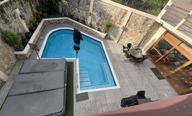 Fully Furnished Two Level House and Lot with Heated pool and Jacuzzi Located in