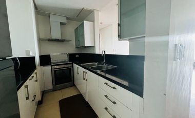 Spacious 2-BR Corner Unit in Alabang. Walking distance to Festival Mall.