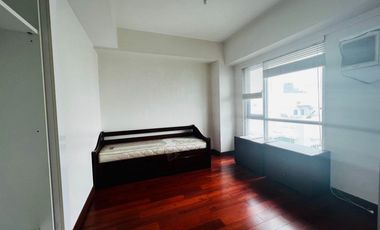 Spacious 2-BR Corner Unit in Alabang. Walking distance to Festival Mall.
