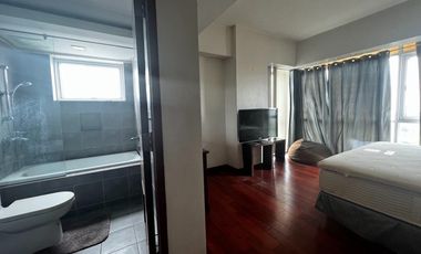 Spacious 2-BR Corner Unit in Alabang. Walking distance to Festival Mall.