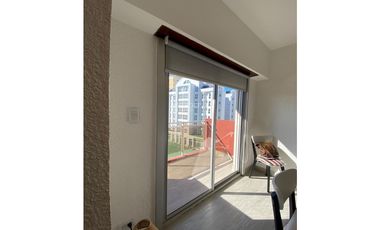 EXCELENTE DEPARTAMENTO DE 2 AMBIENTES CON ESTACIONAMIENTO CUBIERTO