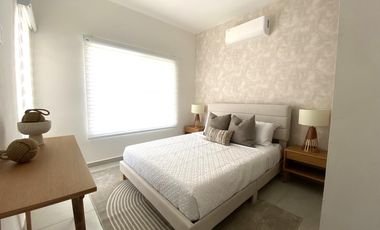 Casa en Playa del Carmen con jardín, estudio y 3 estacionamientos | $2.9 MDP