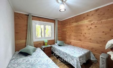 Casa con hermosa cabaña en condominio cerrado