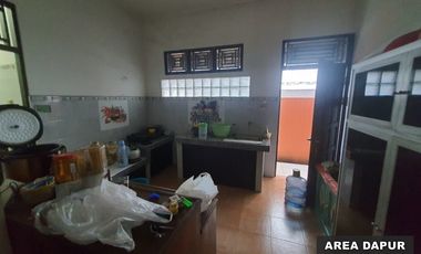 Rumah plus 3pintu toko dan kost di pinggir jl.pramuka banjarmasin