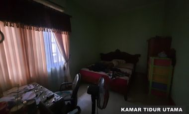 Rumah plus 3pintu toko dan kost di pinggir jl.pramuka banjarmasin