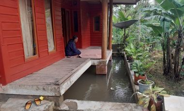 Dijual lahan + villa pinggir jalan