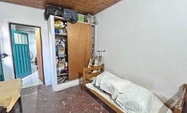 CASA EN LOTE PROPIO CON DEPENDENCIA PROXIMO AL CENTRO COMERC