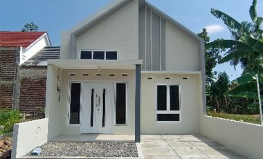 RUMAH CANTIK BERNUANSA ALAM DI TENGAH KOTA