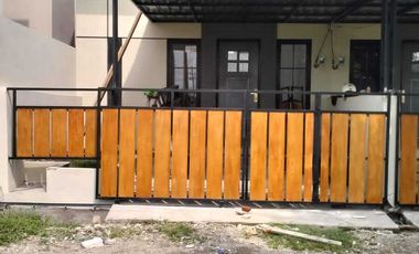 Rumah barat surabaya 3 kamar tidur bebas banjir harga 300 jutaan