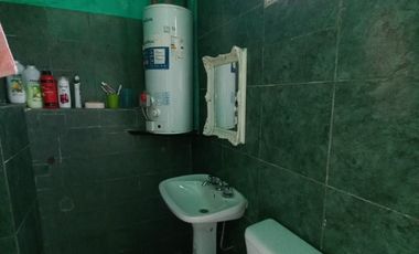 CASA CON DEPARTAMENTOS Y LOCAL