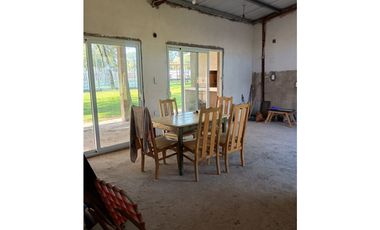 Casita junto al algarrobo! Aires de Colonia!