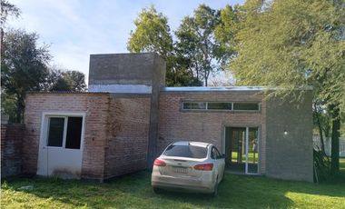 Casita junto al algarrobo! Aires de Colonia!