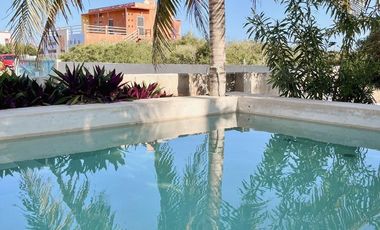 Venta de casa en la playa de una planta con piscina