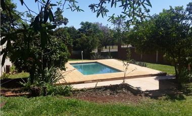 CASA FRENTE AL HOTEL MAITEI, BARRIO PELLEGRINI