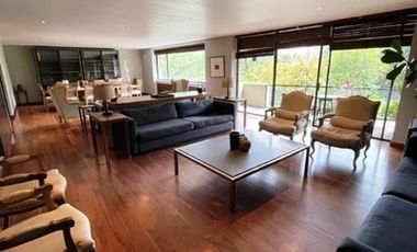 Renta departamento amueblado con terraza y vista arbolada