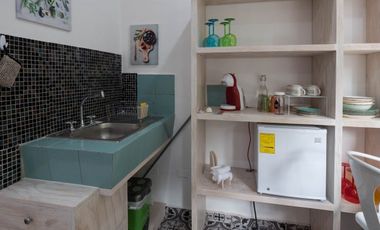 Local comercial con dos departamentos en una ubicación privilegiada en el centro