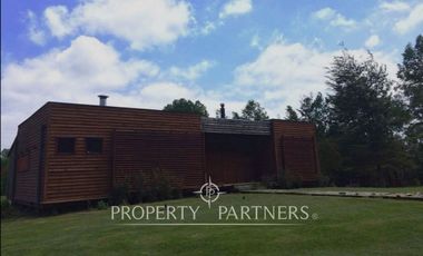 Fabrica  con sala de ventas   en parcela  orilla carretera