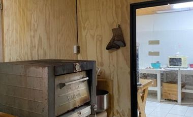 Fabrica  con sala de ventas   en parcela  orilla carretera