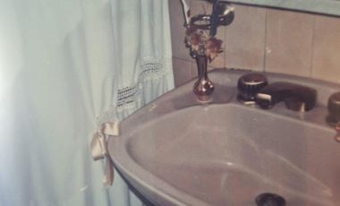 Departamento de cuatro ambientes con Patio y Cochera en Venta en Avellaneda
