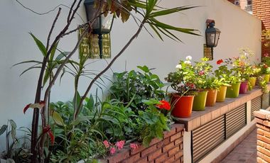 Departamento de cuatro ambientes con Patio y Cochera en Venta en Avellaneda