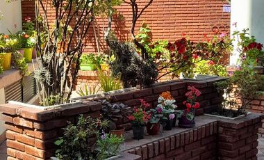 Departamento de cuatro ambientes con Patio y Cochera en Venta en Avellaneda
