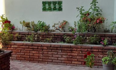 Departamento de cuatro ambientes con Patio y Cochera en Venta en Avellaneda