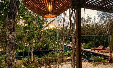 CASA EN VENTA EN TULUM 3 HABITACIONES CON ALBERCA INFINITY, ZONA DE REUNIONES JUEGOS PARA NIÑOS