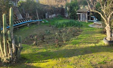 PARCELA CON CASA CAMINO OLMUE