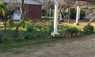 PARCELA CON CASA CAMINO OLMUE