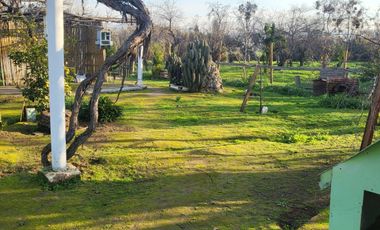 PARCELA CON CASA CAMINO OLMUE