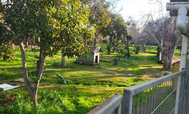 PARCELA CON CASA CAMINO OLMUE