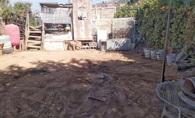 TERRENO PLANO CON CASA PARA MEJORAR VISTA AL MAR