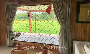 Casona mas 4 cabañas amobladas en terreno de 1,2Ha