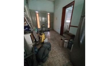 CASA Y LOTE CALLE SEGUI