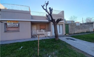 CASA Y LOTE CALLE SEGUI