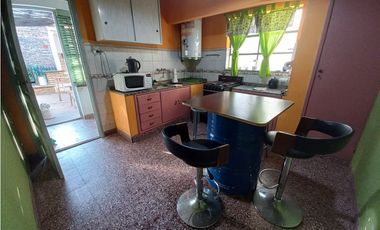 CASA Y LOTE CALLE SEGUI