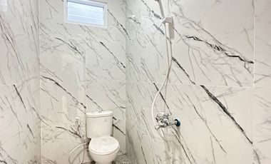 Rumah 1 M an dalam Cluster Exclusive dekat Akses Tol