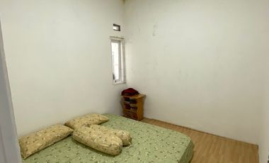 Over boking perumahan