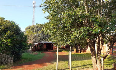 Terreno con casa precaria