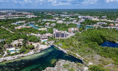 Exclusivo lote en venta frente a la marina en Puerto Aventuras