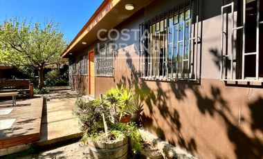 Parcela con casa en Tabolango